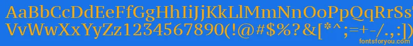 フォントPtz55f – オレンジ色の文字が青い背景にあります。