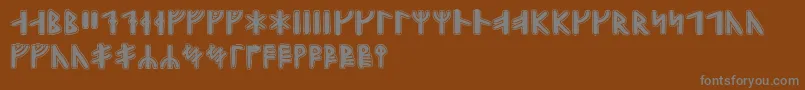 フォントGunnarrunic – 茶色の背景に灰色の文字