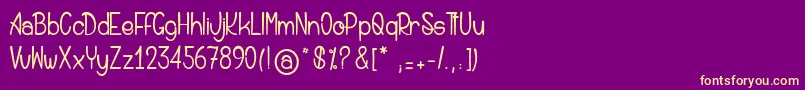 Saintandrewdeskiwis Font – Yellow Fonts on Purple Background