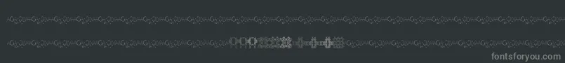 フォントIvyTilesPromo – 黒い背景に灰色の文字