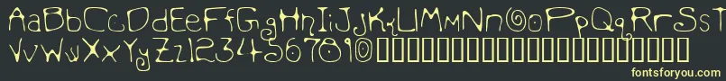 MondoMessoFonto2 Font – Yellow Fonts on Black Background