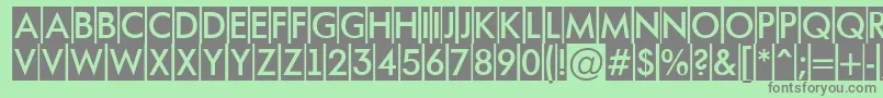 フォントAFuturaortotitulcm – 緑の背景に灰色の文字