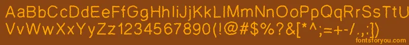 Czcionka Pwzigzagfont – pomarańczowe czcionki na brązowym tle