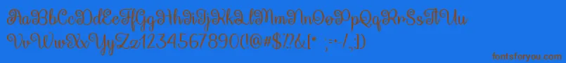 QueenXylophiaTtf-fontti – ruskeat fontit sinisellä taustalla
