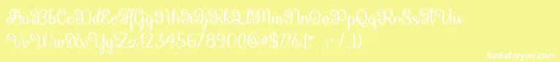 QueenXylophiaTtf Font – White Fonts on Yellow Background