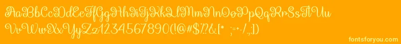 QueenXylophiaTtf-Schriftart – Gelbe Schriften auf orangefarbenem Hintergrund