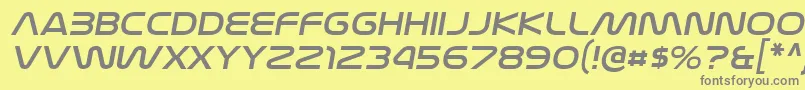 NasalizationexItalic-fontti – harmaat kirjasimet keltaisella taustalla