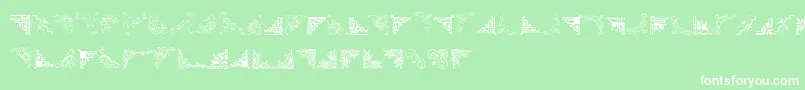 フォントCornpopThree – 緑の背景に白い文字
