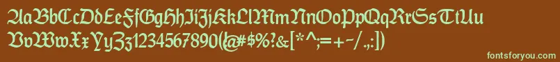 CatfrankenDeutschフォントについての詳細 フォントCatfrankenDeutsch – 緑色の文字が茶色の背景にあります。