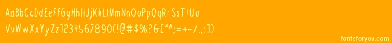 Шрифт DraftingTableCondensed – жёлтые шрифты на оранжевом фоне