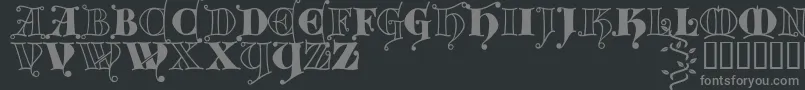 Kingthings Versalis Font – Gray Fonts on Black Background