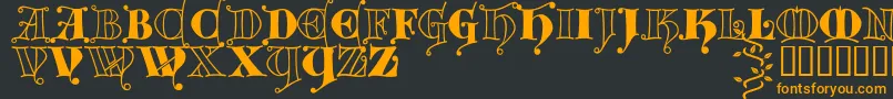 Шрифт Kingthings Versalis – оранжевые шрифты на чёрном фоне