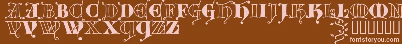 Kingthings Versalis-fontti – vaaleanpunaiset fontit ruskealla taustalla