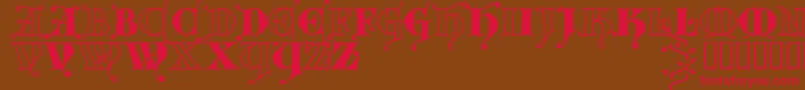 Kingthings Versalis-fontti – punaiset fontit ruskealla taustalla