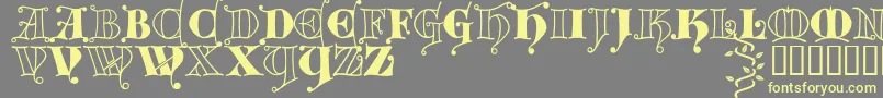 Kingthings Versalis-fontti – keltaiset fontit harmaalla taustalla