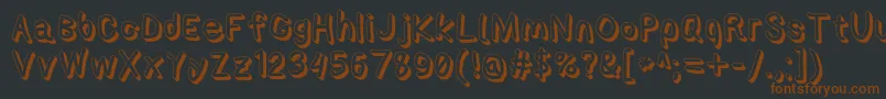 Applestormshdxbd-fontti – ruskeat fontit mustalla taustalla