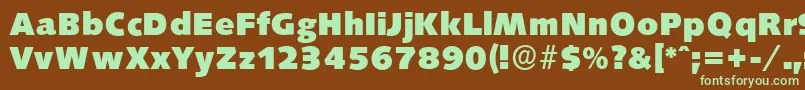 フォントSaxonyserialHeavyRegular – 緑色の文字が茶色の背景にあります。