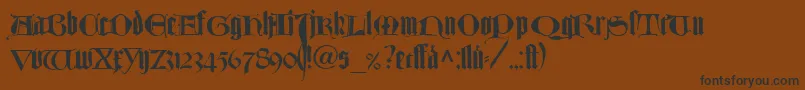 TexturlombardischLtDfr-Schriftart – Schwarze Schriften auf braunem Hintergrund