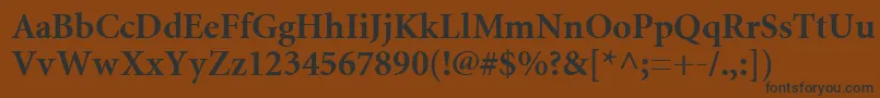フォントMiniatureBold – 黒い文字が茶色の背景にあります