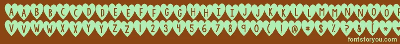 Kgiandloveandyou-fontti – vihreät fontit ruskealla taustalla