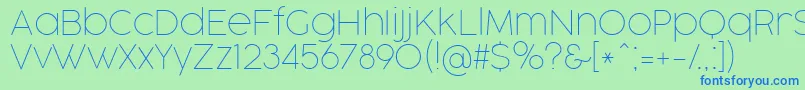 Czcionka CocogooseProThinTrial – niebieskie czcionki na zielonym tle