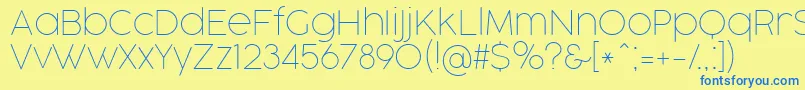 Czcionka CocogooseProThinTrial – niebieskie czcionki na żółtym tle