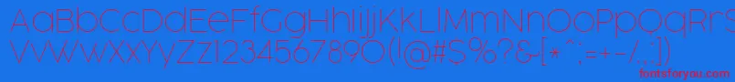 CocogooseProThinTrial-Schriftart – Rote Schriften auf blauem Hintergrund