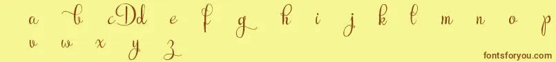 RubyntDemo-Schriftart – Braune Schriften auf gelbem Hintergrund