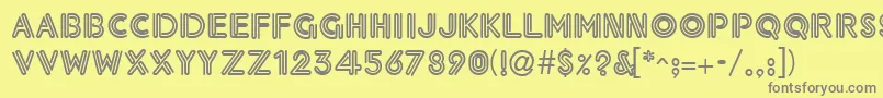 フォントNeonThick – 黄色の背景に灰色の文字