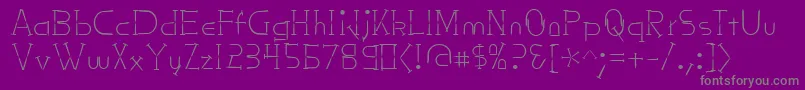 Nailsnstaples-fontti – harmaat kirjasimet violetilla taustalla