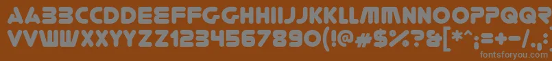 Youregone-fontti – harmaat kirjasimet ruskealla taustalla