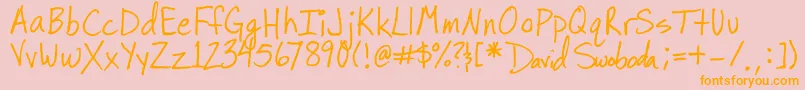 フォントSugarpie – オレンジの文字がピンクの背景にあります。