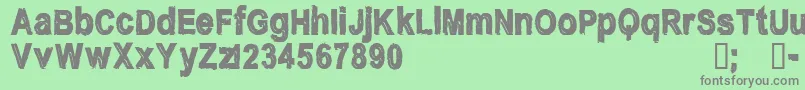 Więcej informacji o czcionce CfnostalgiaRegular Czcionka CfnostalgiaRegular – szare czcionki na zielonym tle