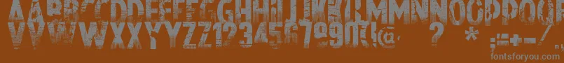 Nowharehouse-Schriftart – Graue Schriften auf braunem Hintergrund