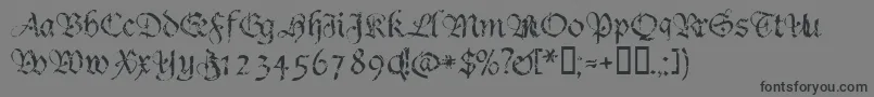 Crumble-Schriftart – Schwarze Schriften auf grauem Hintergrund