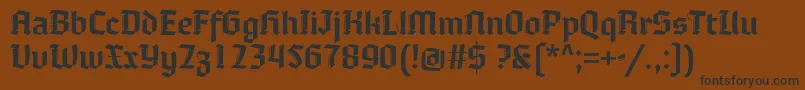 Moyenage Font – Black Fonts on Brown Background