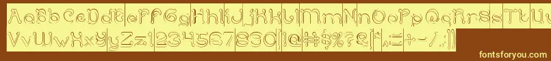 ArabianKnightHollowInverse-fontti – keltaiset fontit ruskealla taustalla