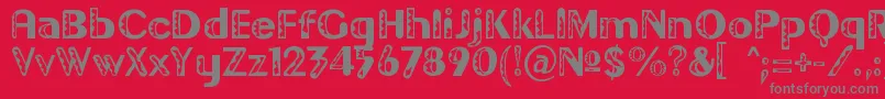 Gilgond-Schriftart – Graue Schriften auf rotem Hintergrund