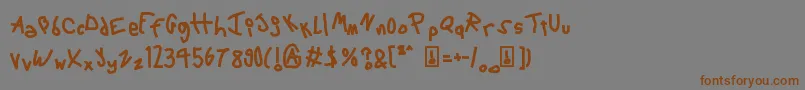 フォント6Script – 茶色の文字が灰色の背景にあります。