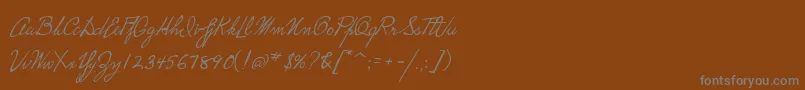 P22HopperEdward Font – Gray Fonts on Brown Background