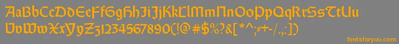 Weissrundgotisch-Schriftart – Orangefarbene Schriften auf grauem Hintergrund