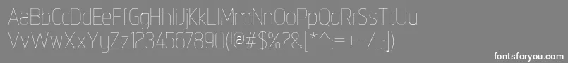 IntropolThin-fontti – valkoiset fontit harmaalla taustalla