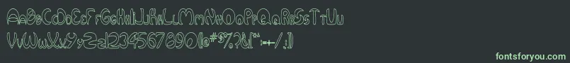 Шрифт QurveHollowThin – зелёные шрифты на чёрном фоне