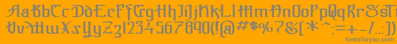 TheBlackBloc-fontti – harmaat kirjasimet oranssilla taustalla