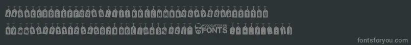 Czcionka WoodcutterTagsOnARope – szare czcionki na czarnym tle
