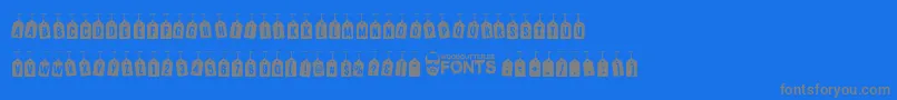 Fonte WoodcutterTagsOnARope – fontes cinzas em um fundo azul