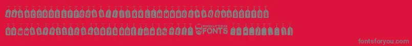 WoodcutterTagsOnARope Font – Gray Fonts on Red Background