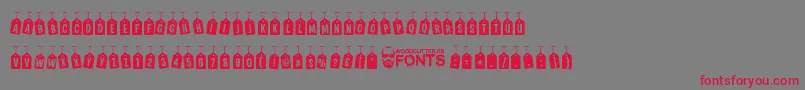 WoodcutterTagsOnARope Font – Red Fonts on Gray Background