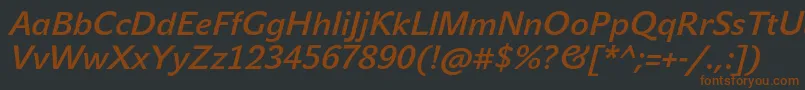 Czcionka JohnsansMediumProItalic – brązowe czcionki na czarnym tle