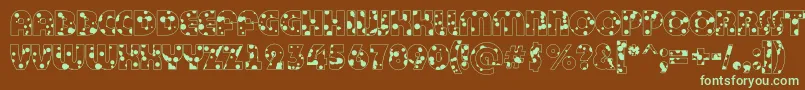 フォントBighaustitulotldrRegular – 緑色の文字が茶色の背景にあります。